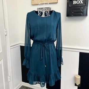 Dark blue dress with tie at waist